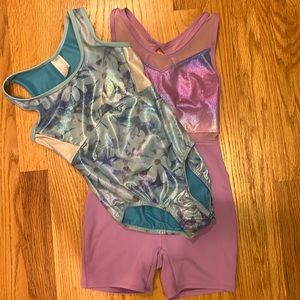 Set of two gymnastics leotards size medium, 7/8